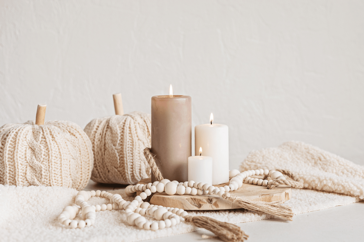 cozy autumn decor and candles for fall season