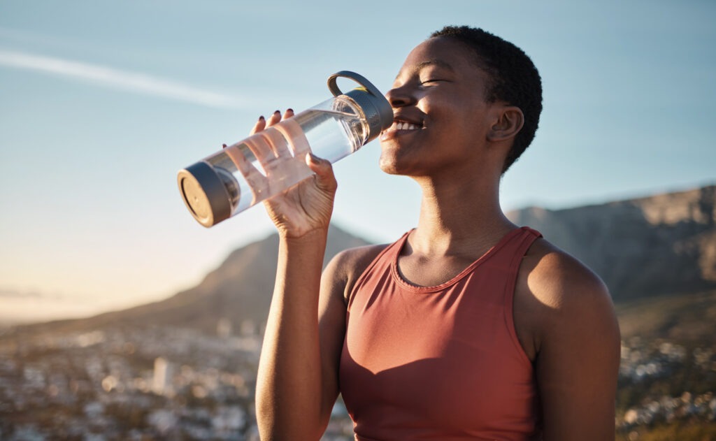 lady drinking water culver city workout upper ivy apartments