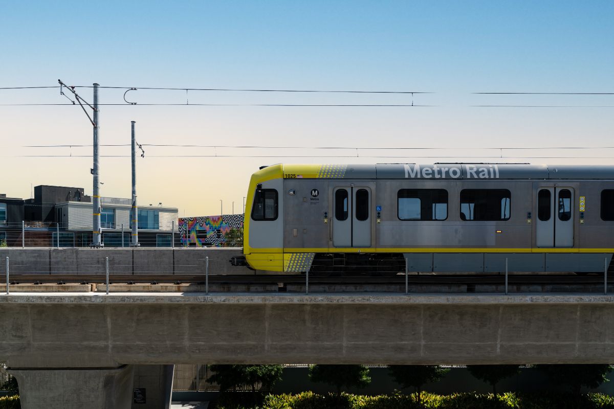 LA Metro E Line arriving at rail station